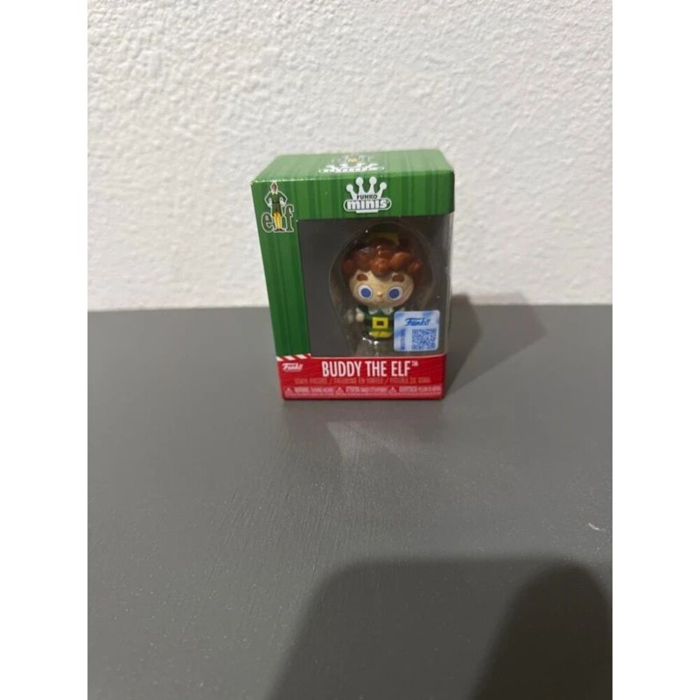 NWT Buddy the elf vinyl figure